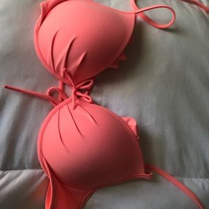 Victoria’s Secret Ruffle Bathing suit top: 34C